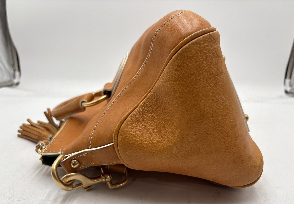 Dooney and Bourke caramel brown leather satchel with brass-tone hardware and rolled handles, view 2
