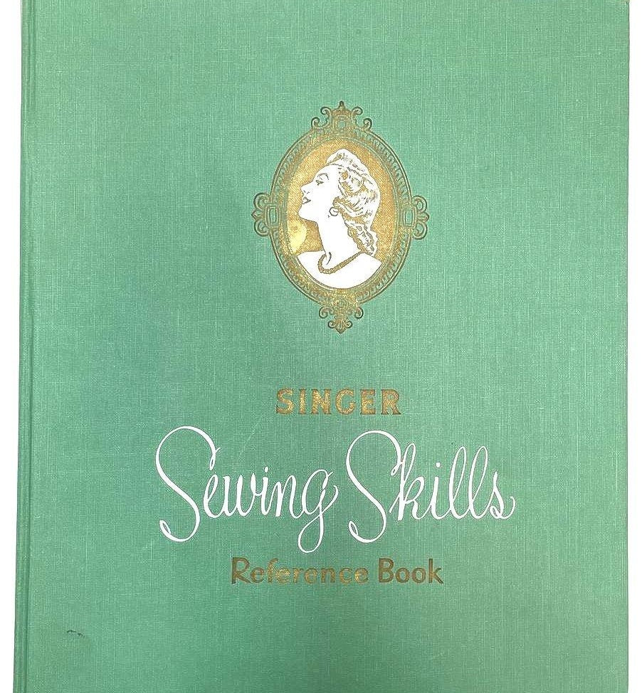 Singer Sewing Skills green cloth hardcover reference book with illustrated instructions, view 3
