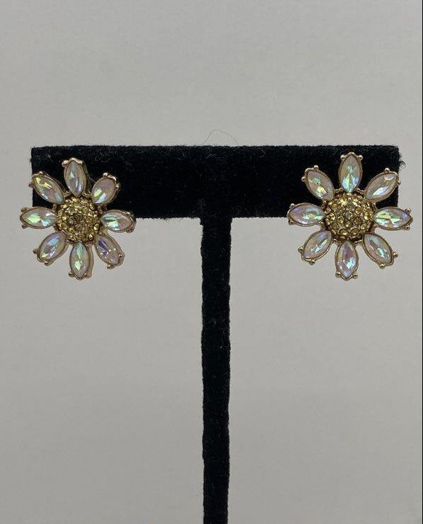 Gold-tone daisy post earrings with iridescent crystal-style petals and yellow rhinestone centers, view 6