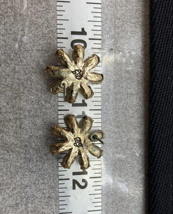 Gold-tone daisy post earrings with iridescent crystal-style petals and yellow rhinestone centers, view 8