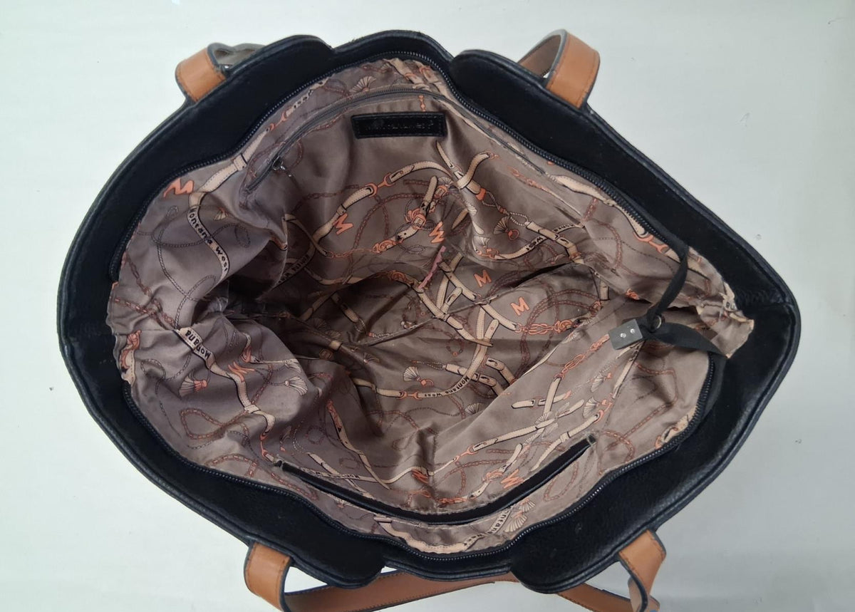 Black faux leather tote with brown handles and brown accent stitching, view 5