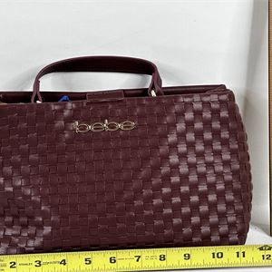 bebe burgundy woven-texture small satchel with top handle and gold-tone logo hardware, view 2