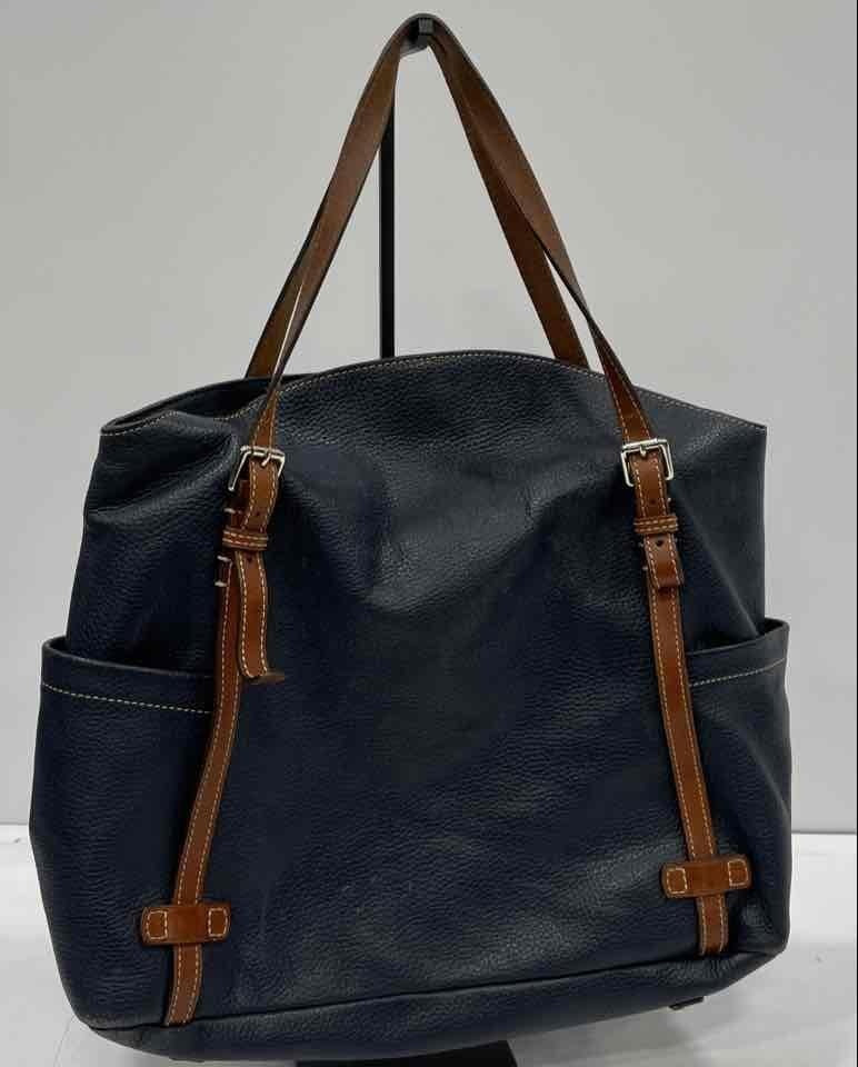 Dooney and Bourke navy pebbled leather large tote with brown trim and gold-tone logo plate, view 4