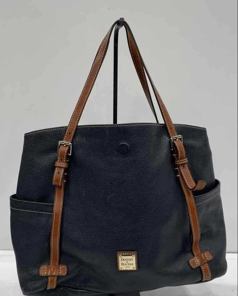 Dooney and Bourke navy pebbled leather large tote with brown trim and gold-tone logo plate, view 6