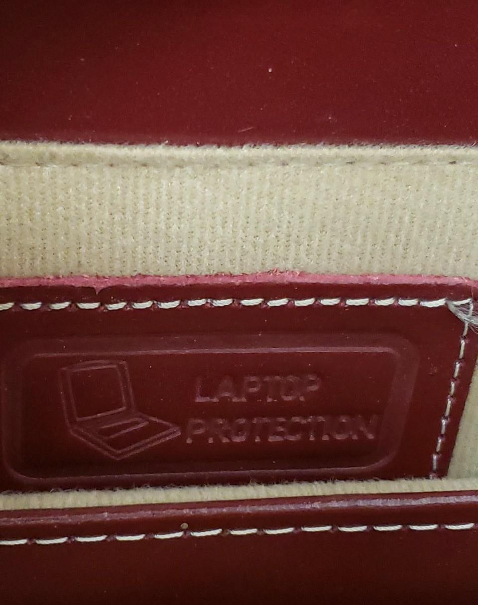 McKleinUSA burgundy leather laptop tote with front flap lock closure, view 5