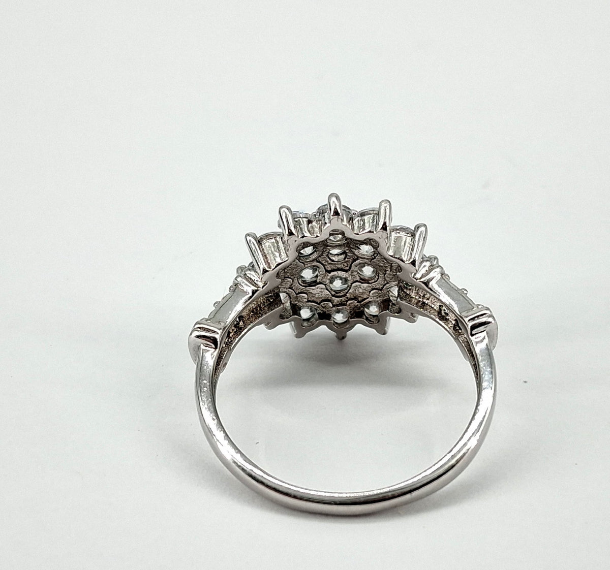 Silver cluster ring with starburst of round clear glass stones, view 5