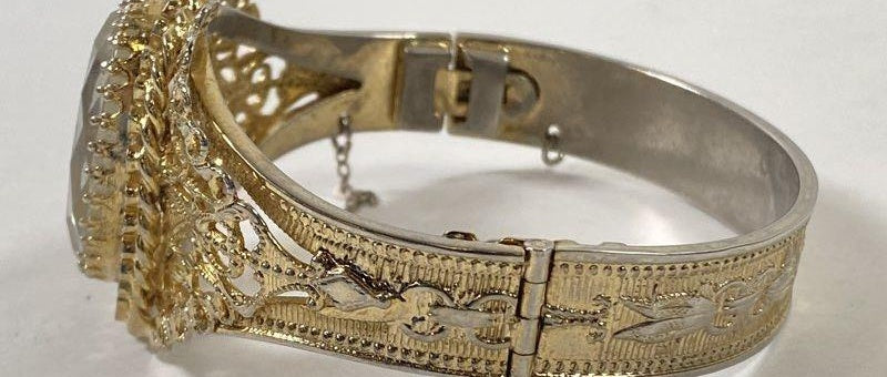 Signed Whiting and Davis gold-tone hinged bracelet with clear intaglio portrait cameo, view 3