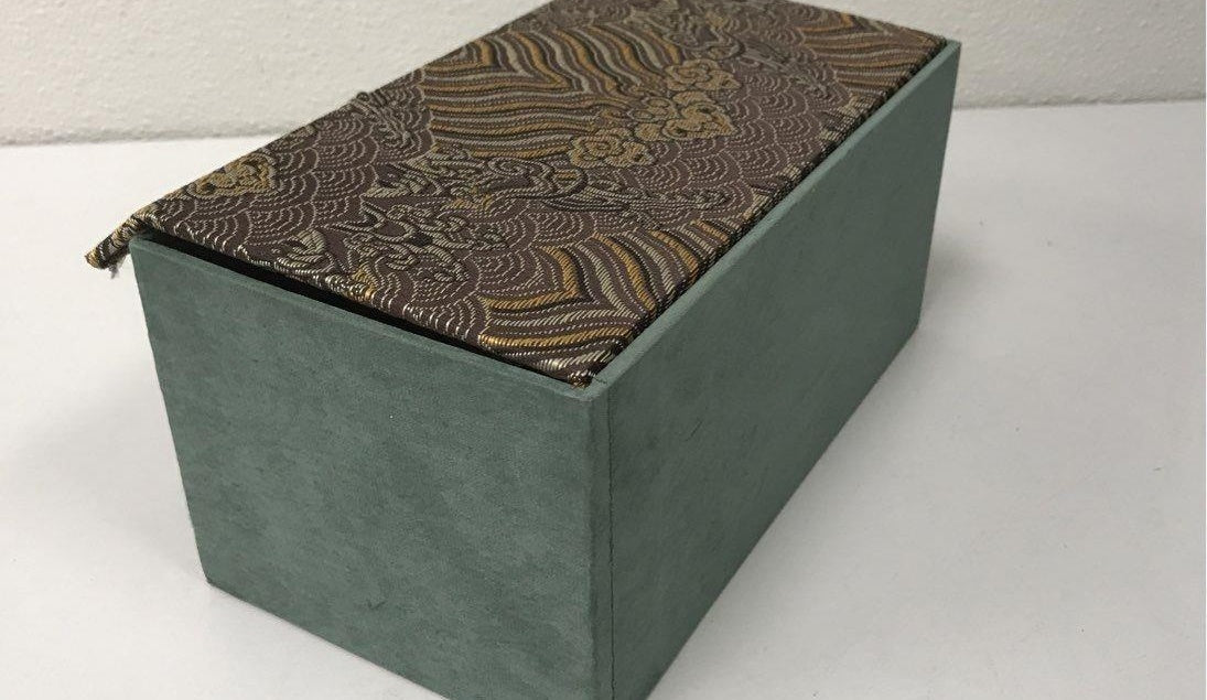 Two small peacock-style gold, silver and multicolor metallic ceramic cups in decorative box, view 3