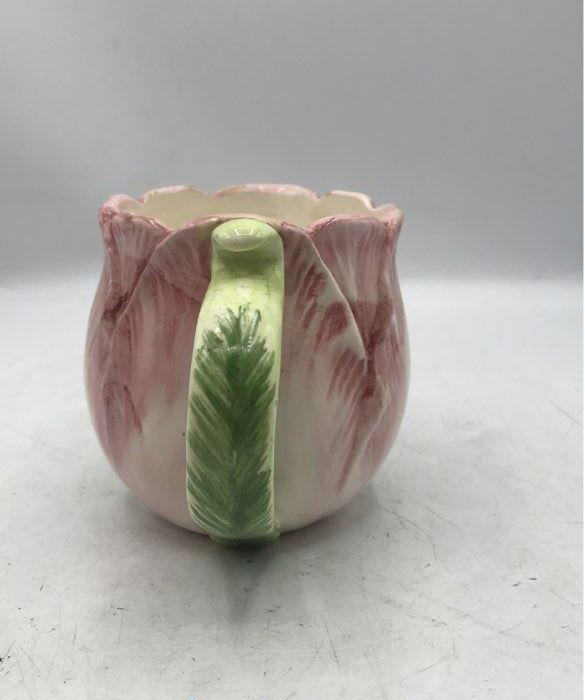 Pink tulip-shaped ceramic teapot with creamer and sugar bowl and green leaf accents, view 3