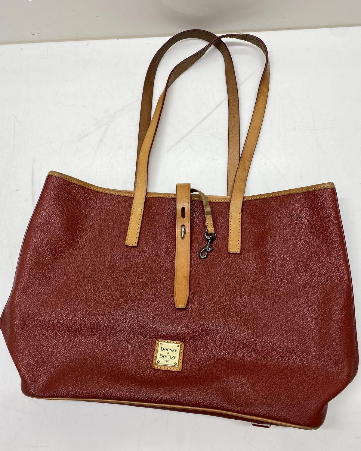 Dooney and Bourke red pebbled leather tote with tan trim, sold for repair or parts, view 5