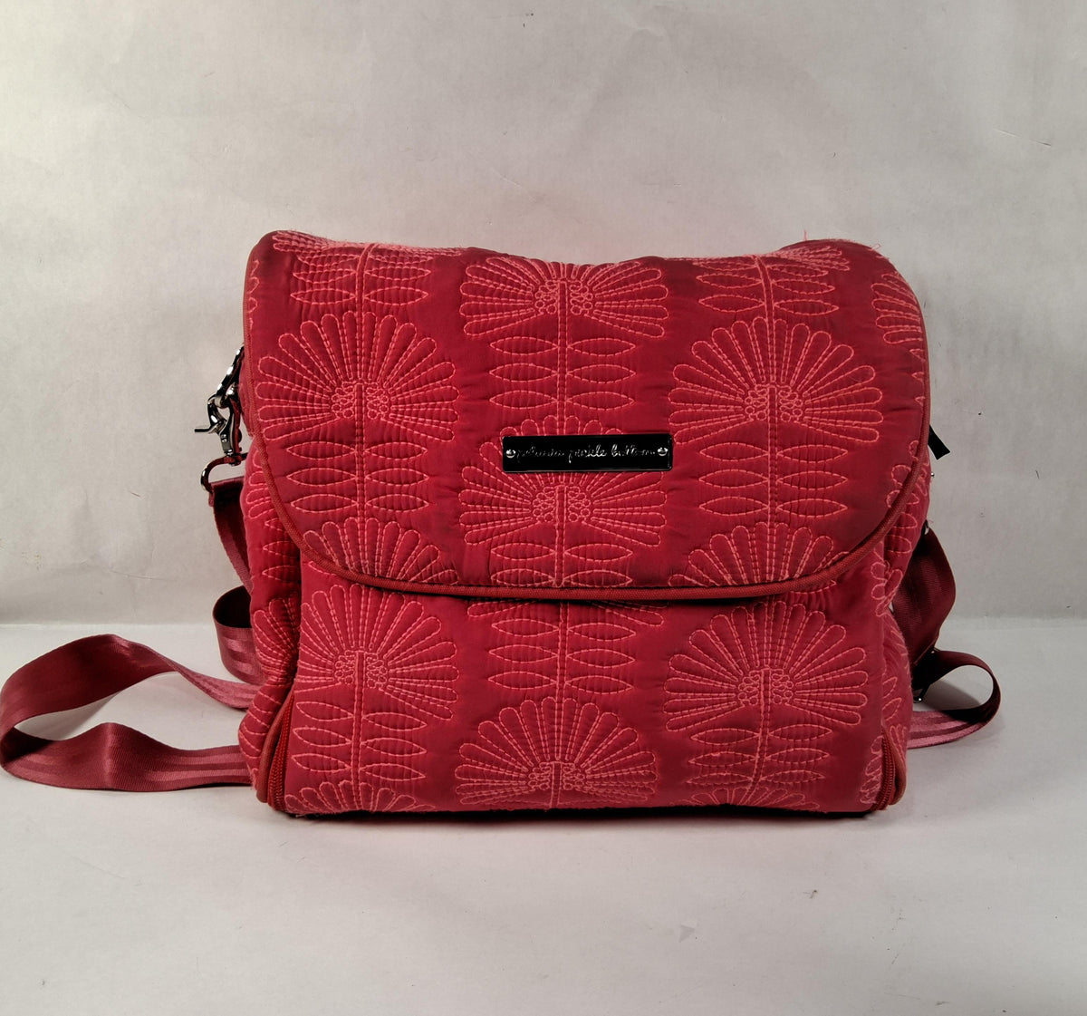 Pink quilted floral diaper bag with foldover flap and shoulder strap, view 5