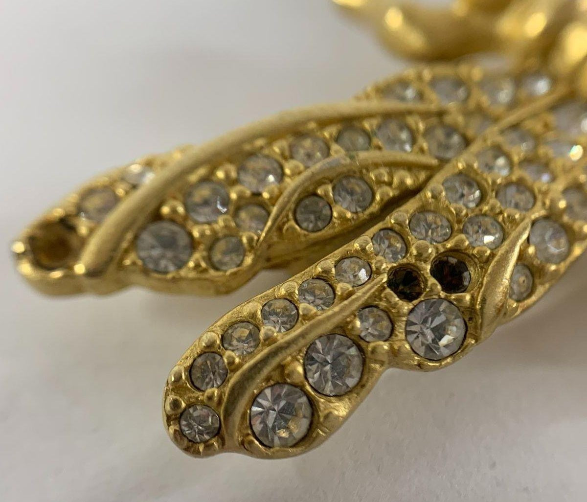 Gold-tone dragonfly brooch with clear crystals, several crystals missing from the wings, view 4