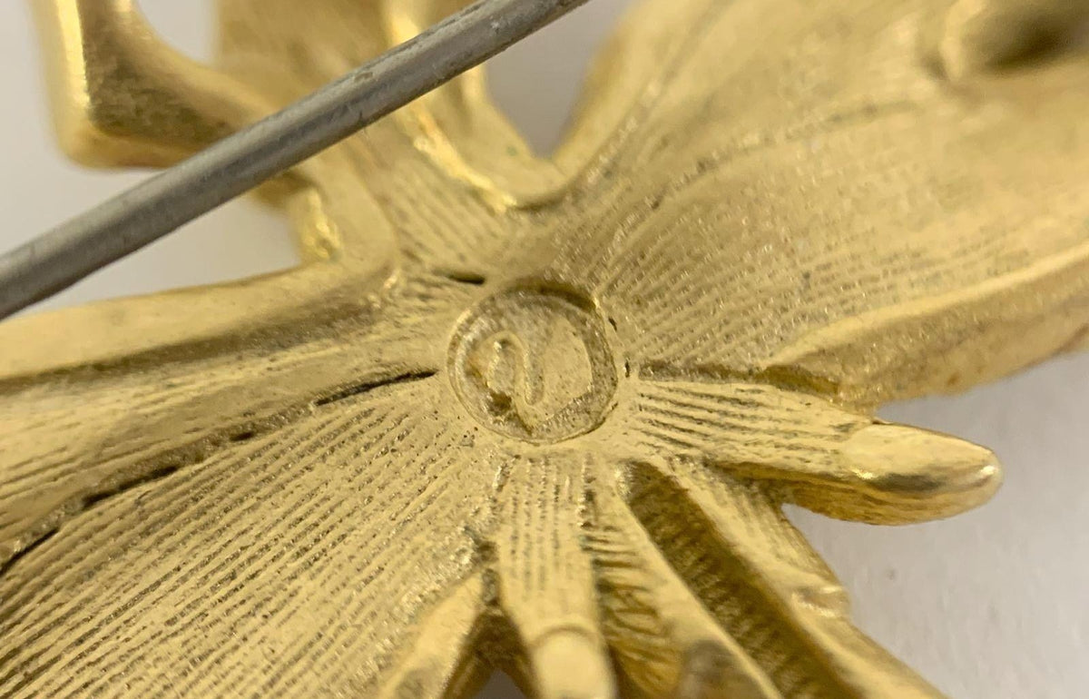 Gold-tone dragonfly brooch with clear crystals, several crystals missing from the wings, view 5