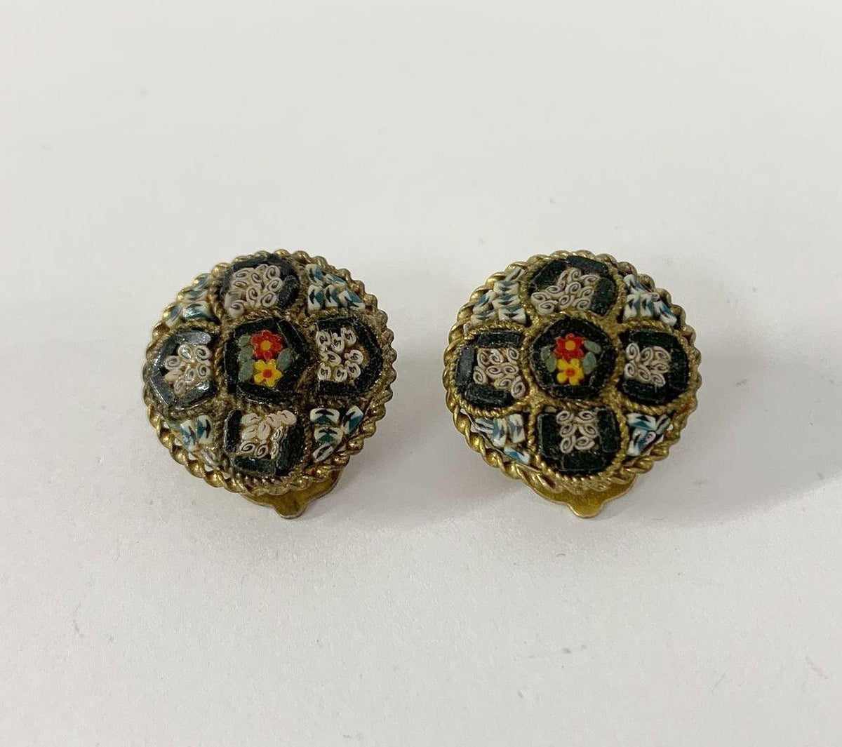 Round gold-tone clip-on earrings with mosaic glass flower and rope-twist border, view 2