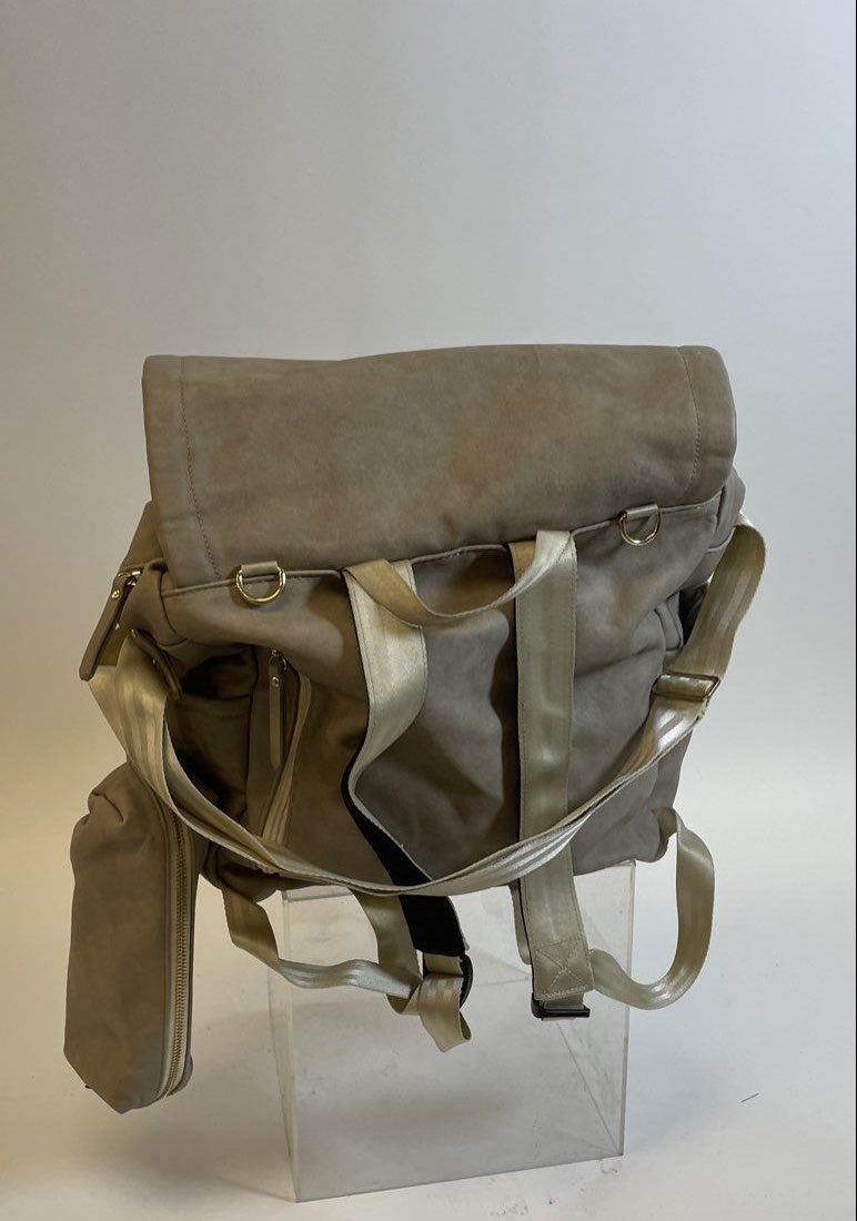 Petunia Pickle Bottom brown diaper bag with foldover flap and floral lining, view 3