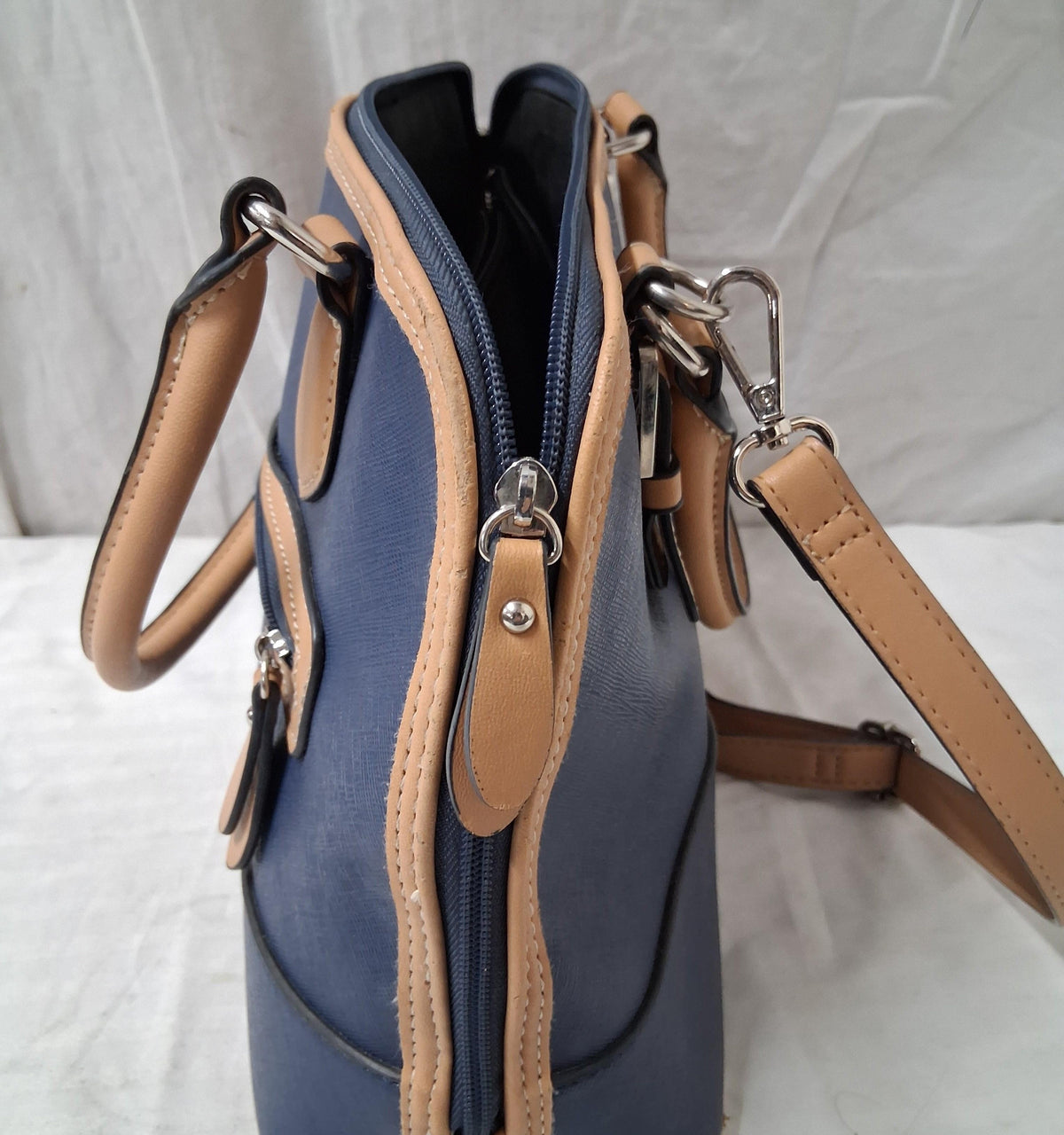 Giani Bernini navy blue satchel with tan trim, gold-tone hardware and crossbody strap, view 3