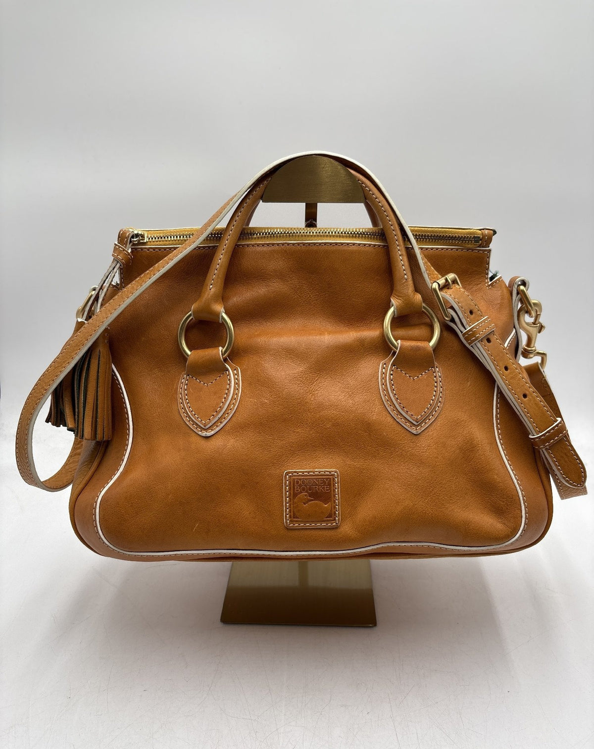 Dooney and Bourke caramel brown leather satchel with brass-tone hardware and rolled handles, view 5