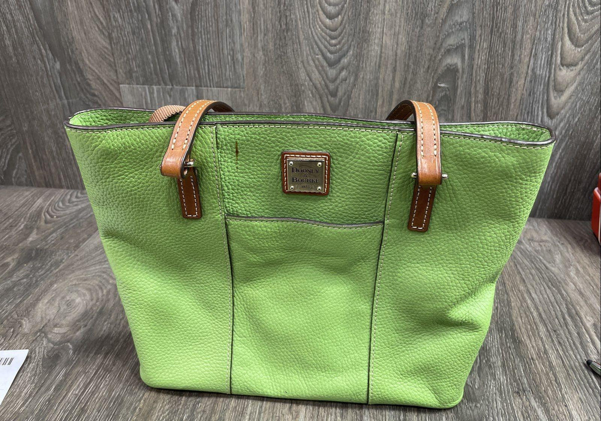 Dooney & Bourke lime green pebbled leather tote with tan leather buckle handles and logo plate, view 2