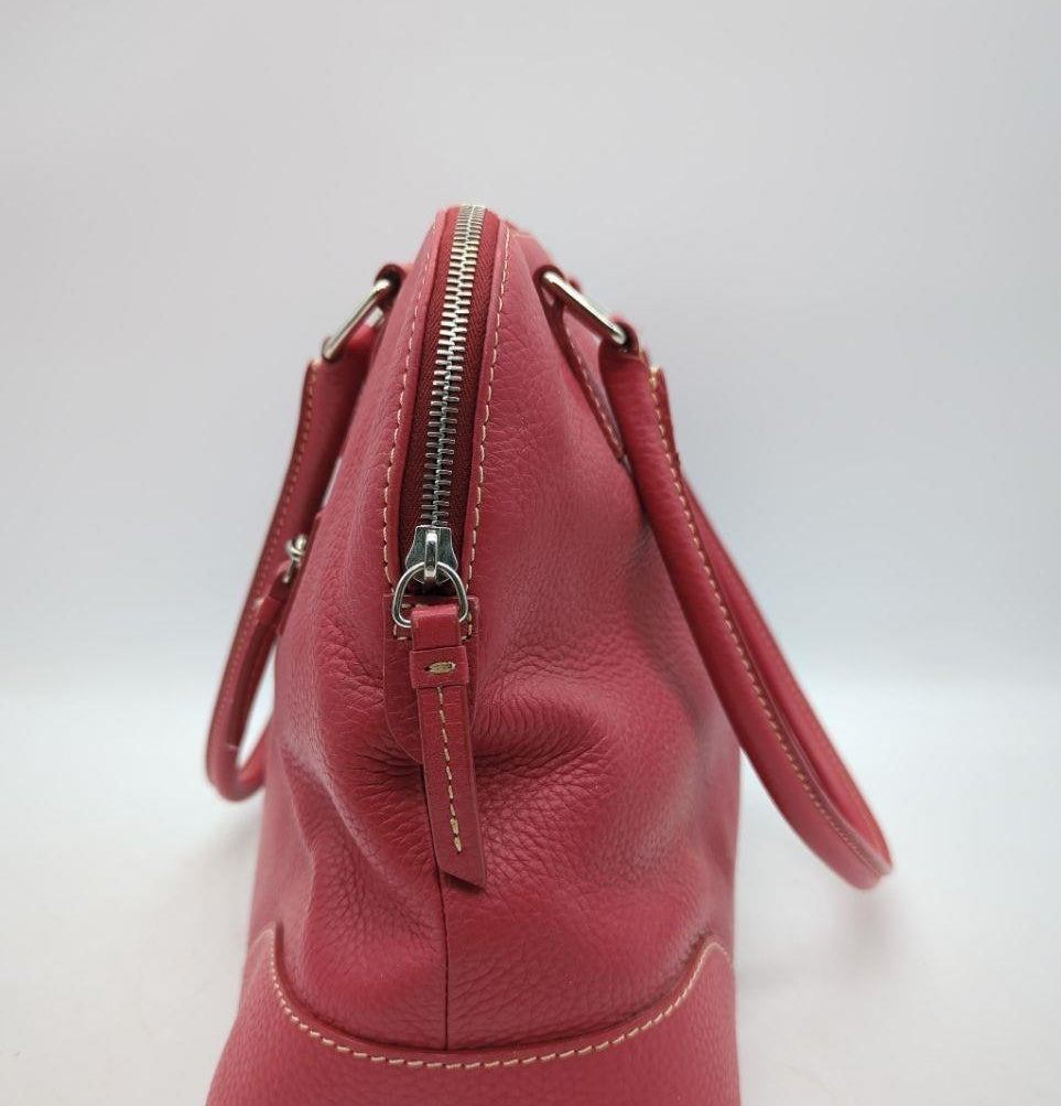 Dooney and Bourke rose pink pebbled leather domed satchel with rolled handles and shoulder strap, view 3