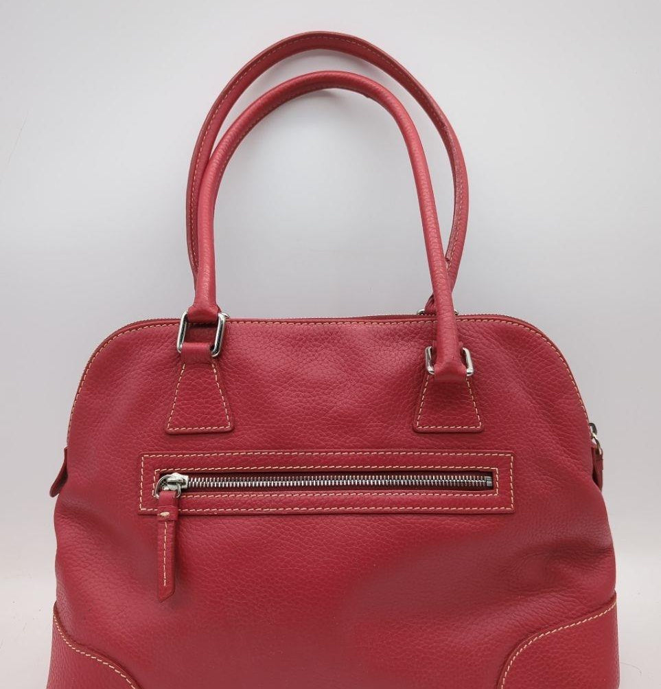 Dooney and Bourke rose pink pebbled leather domed satchel with rolled handles and shoulder strap, view 4