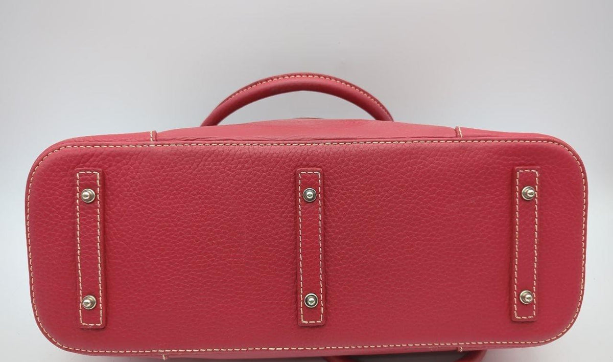 Dooney and Bourke rose pink pebbled leather domed satchel with rolled handles and shoulder strap, view 6