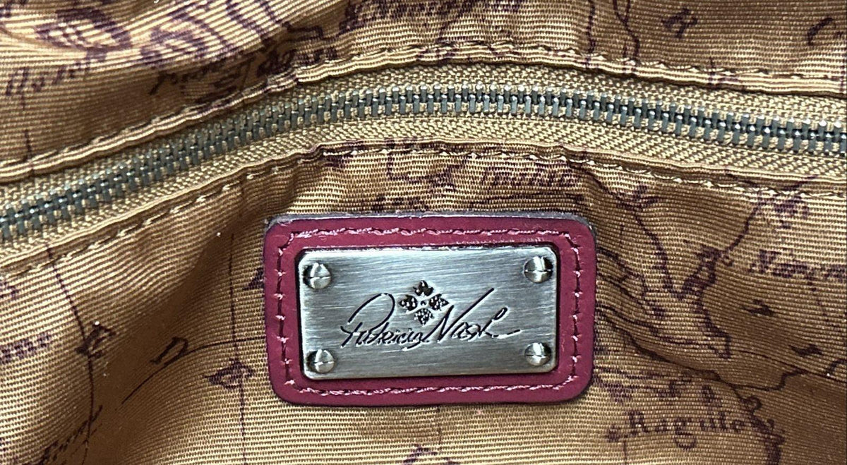 Magenta woven leather satchel with rolled top handle, crossbody strap and silver-tone hardware, view 7