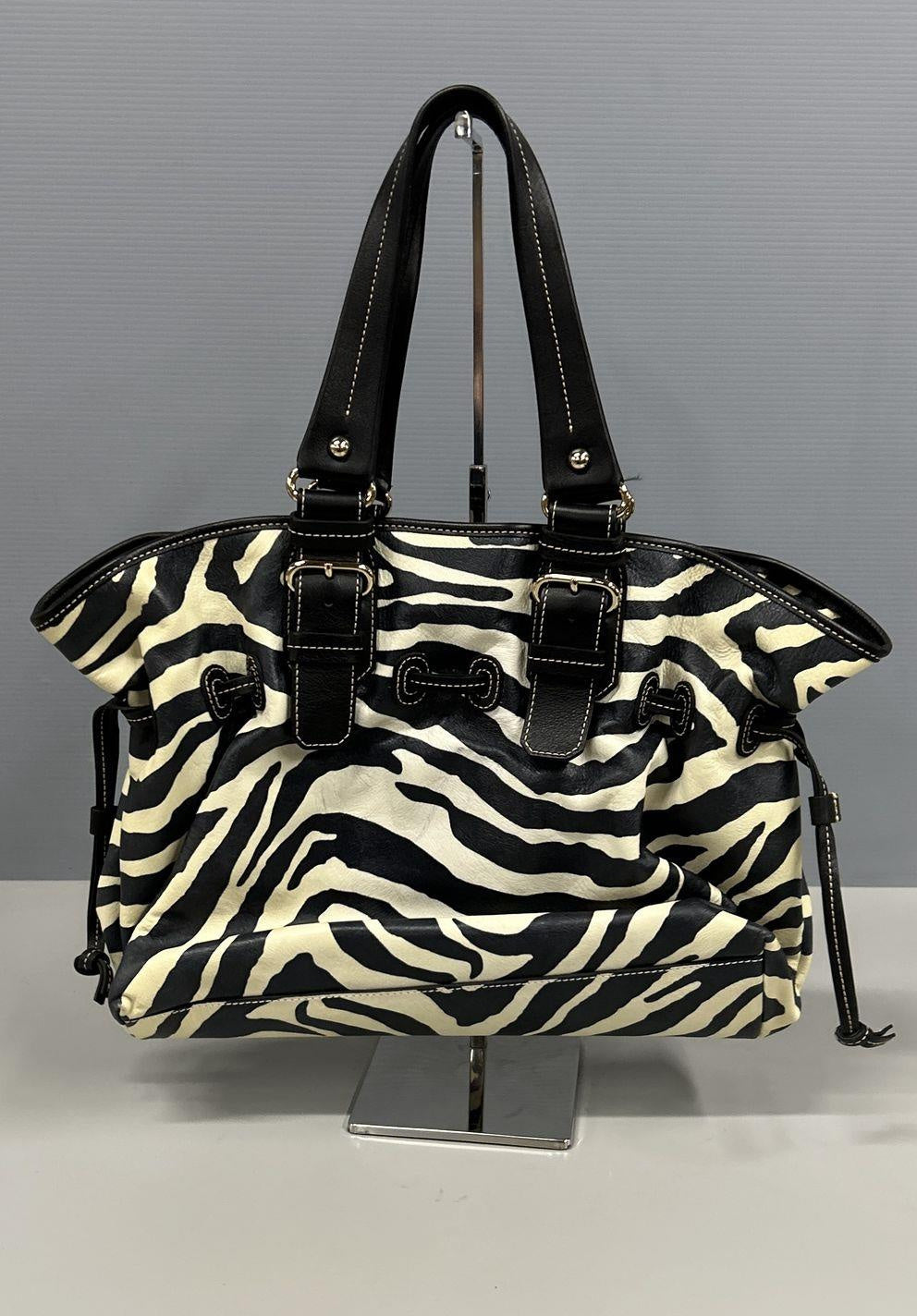 Dooney & Bourke black and white zebra print satchel with black leather trim and silver-tone logo plate, view 4