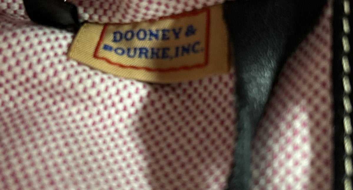 Dooney & Bourke black and white zebra print satchel with black leather trim and silver-tone logo plate, view 8