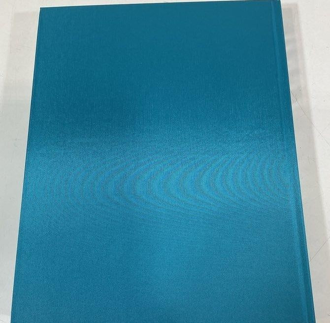 Vogue The Gown by Jo Ellison, turquoise hardcover with black slipcase, view 6