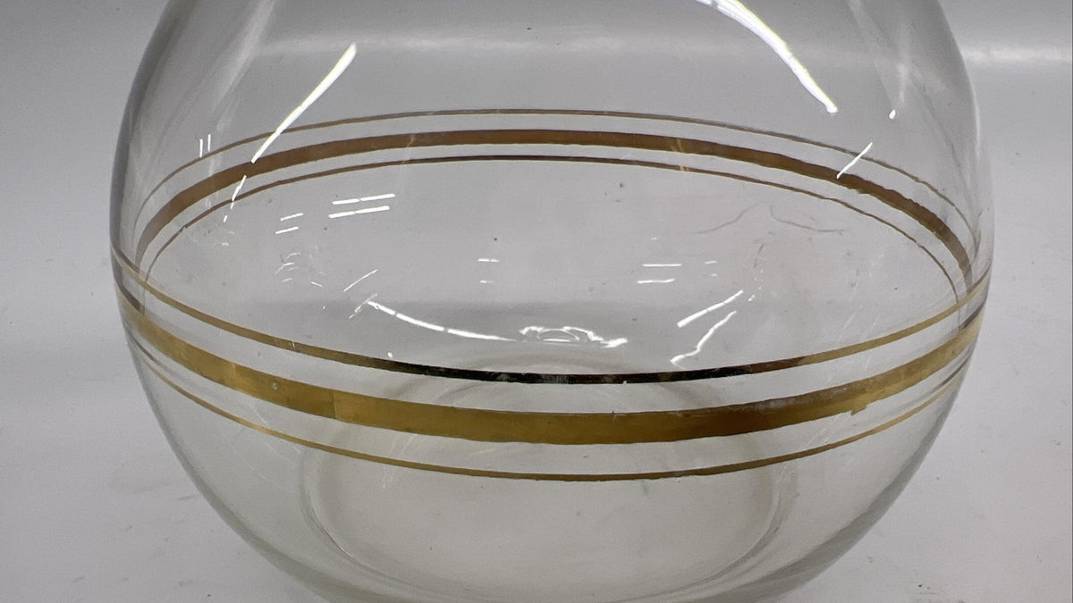 Clear glass decanter with gold accent bands and matching stopper, view 3
