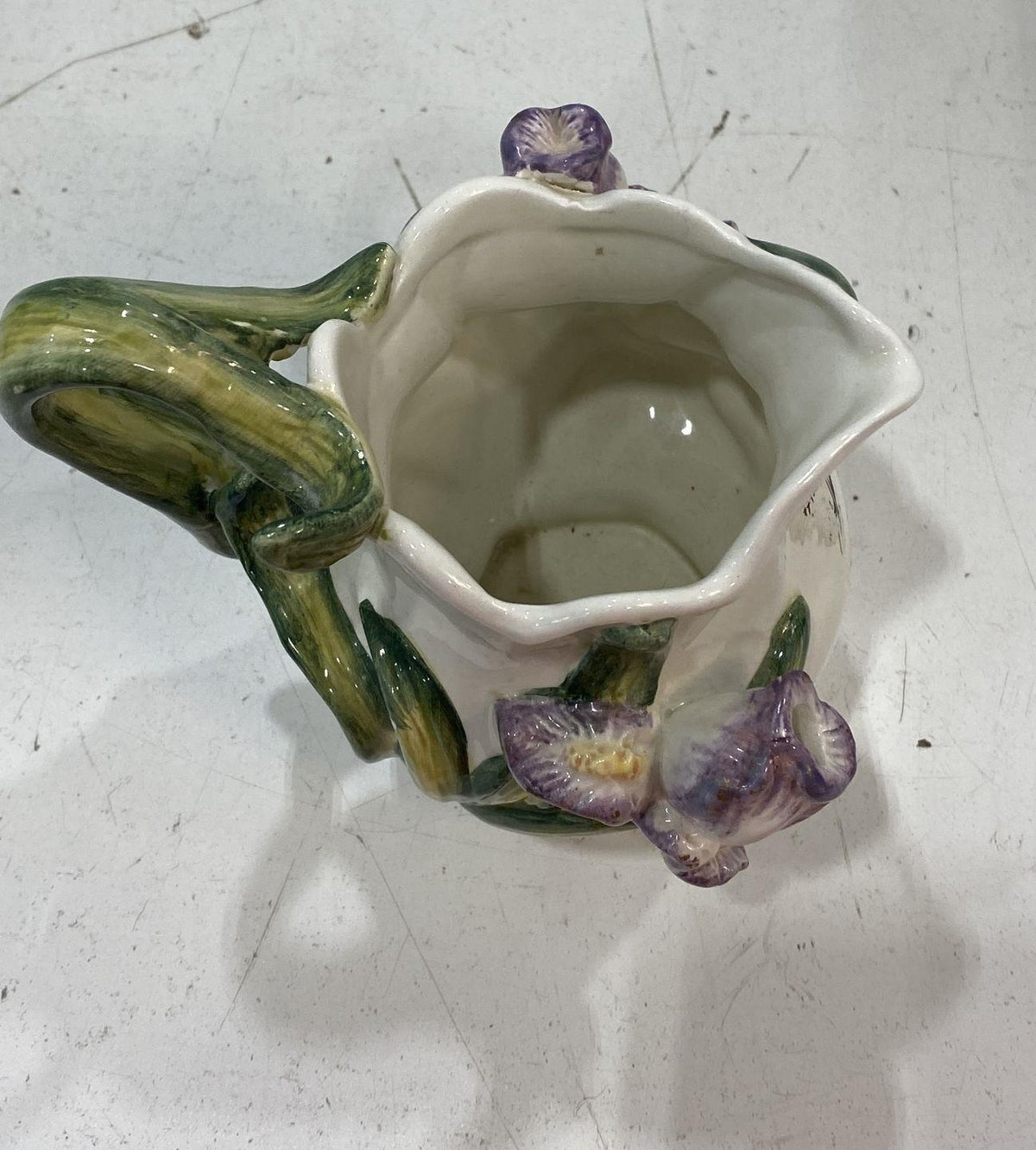 Kaldun and Bogle white ceramic creamer with raised iris flowers and green leaves, view 3