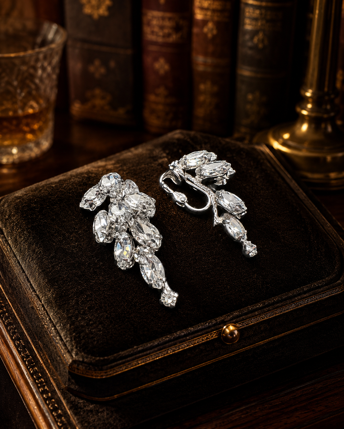 Signed Carnegie silver-tone clip earrings with cascading clear marquise rhinestones