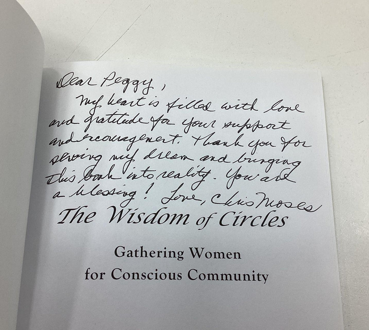 The Wisdom of Circles by Christine Moses, paperback with blue cover and handwritten inscription, view 6