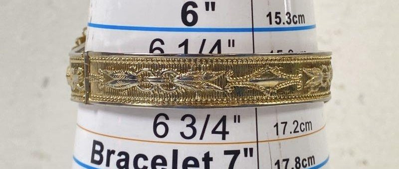 Signed Whiting and Davis gold-tone hinged bracelet with clear intaglio portrait cameo, view 5