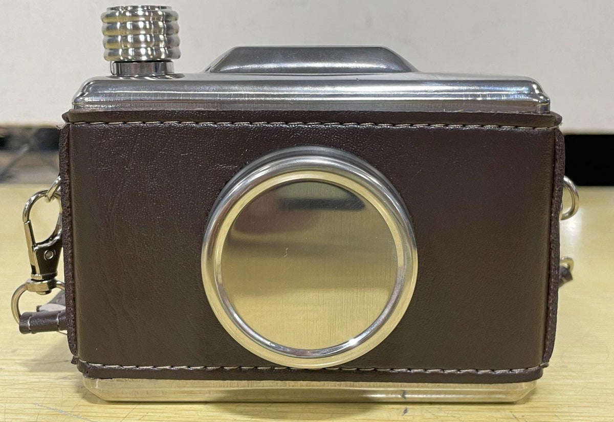 Brown and silver-tone camera-shaped stainless steel hip flask with strap, funnel and box, view 5