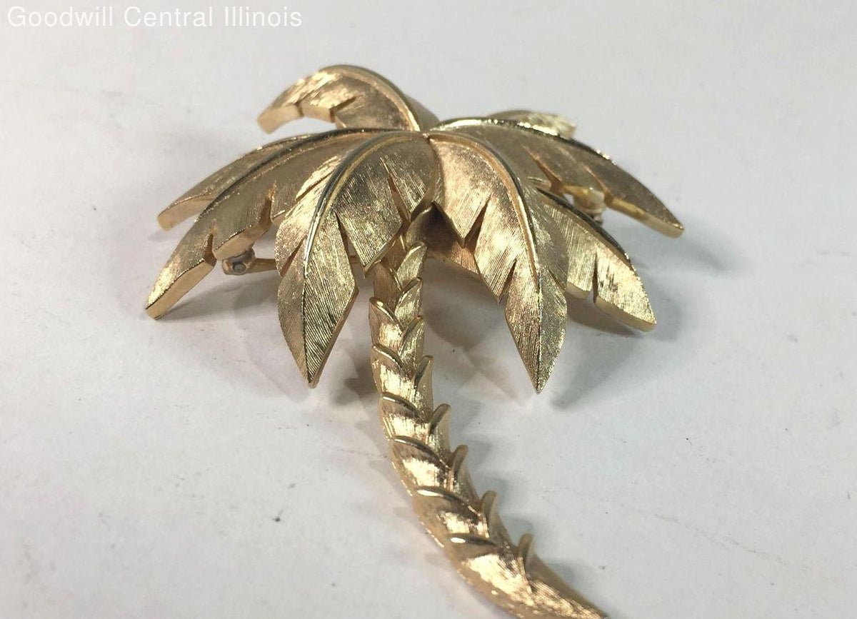 Gold-tone palm tree brooch with textured fronds and curved trunk, view 5