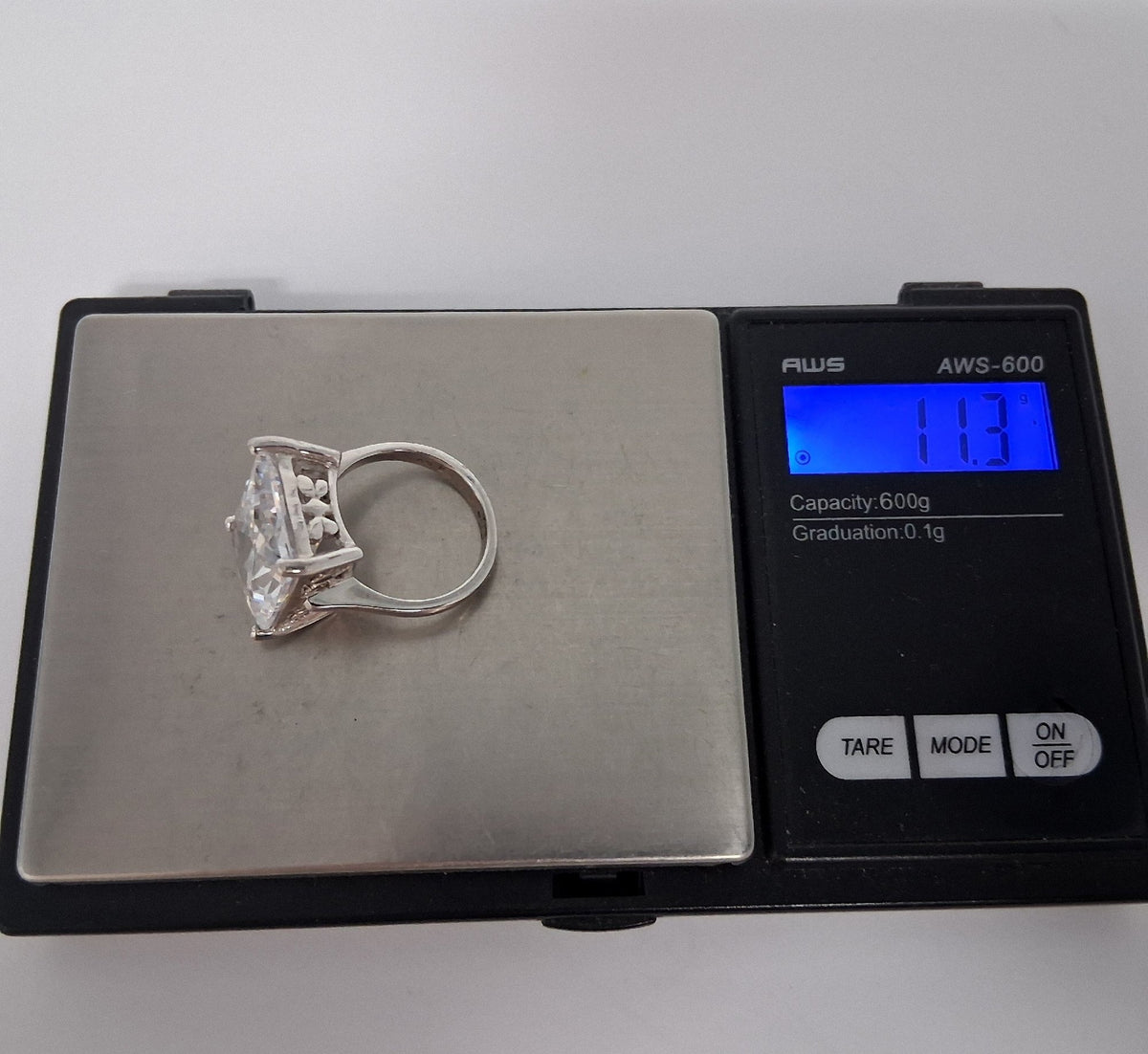 Silver-tone cocktail ring with large rectangle-cut clear center stone, view 8