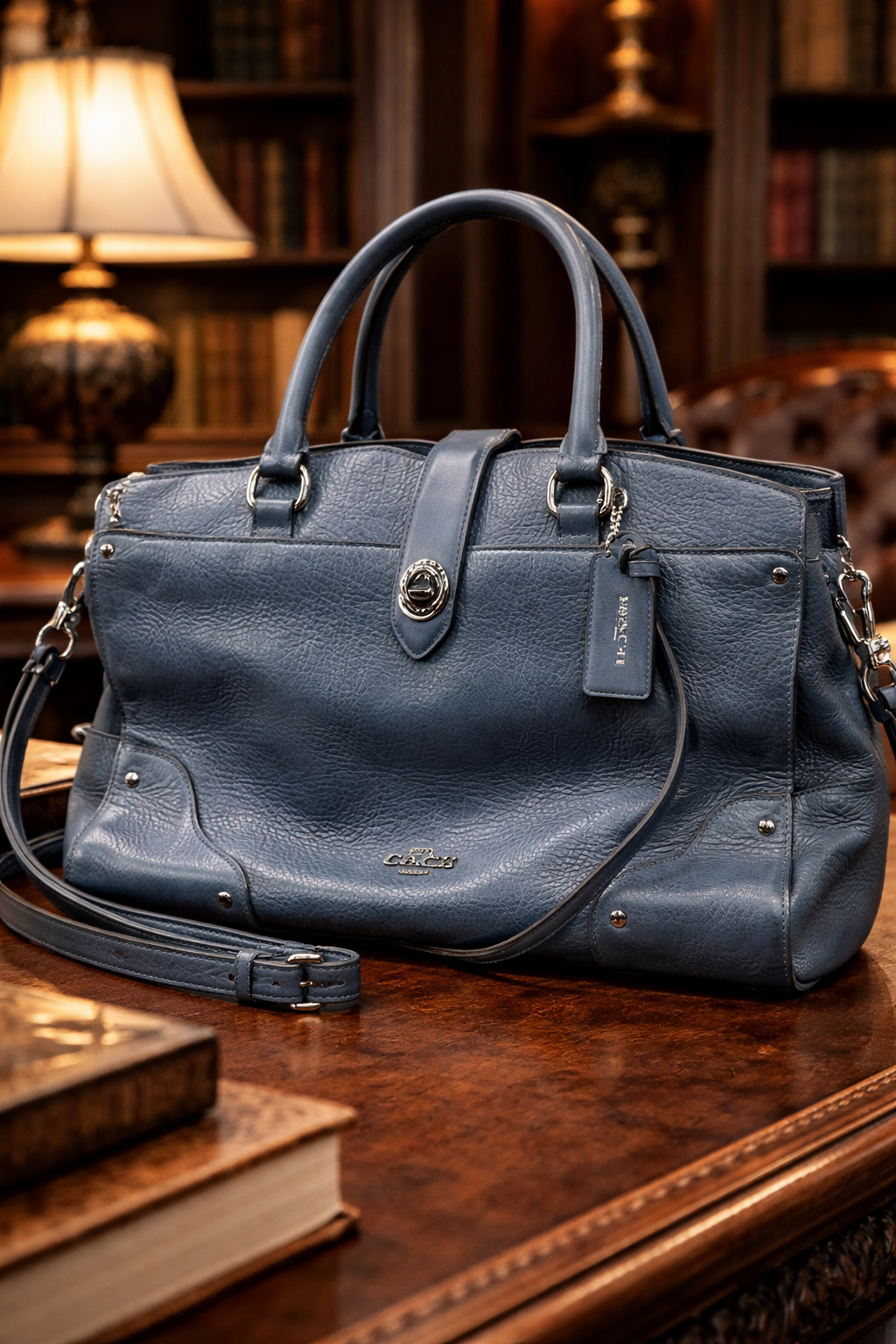 Coach slate blue pebbled leather satchel with turn-lock and crossbody strap