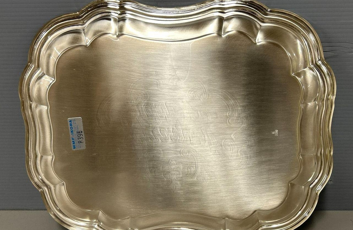 Silver-colored WMF Ikora scalloped serving plate with hammered center and raised Happy Anniversary, view 4