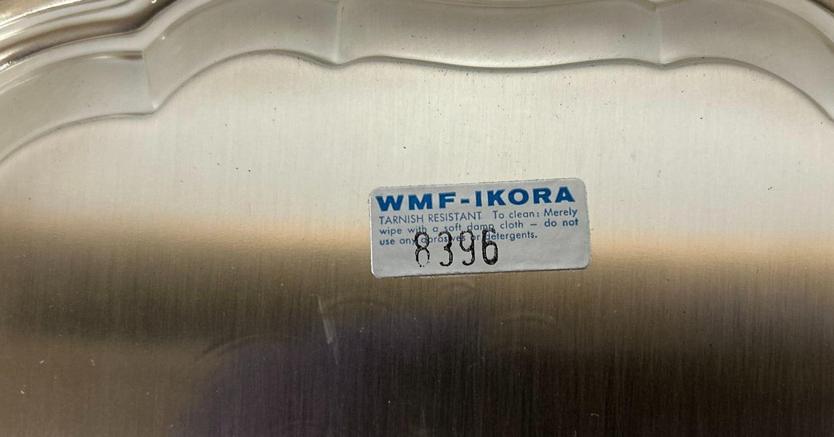 Silver-colored WMF Ikora scalloped serving plate with hammered center and raised Happy Anniversary, view 6