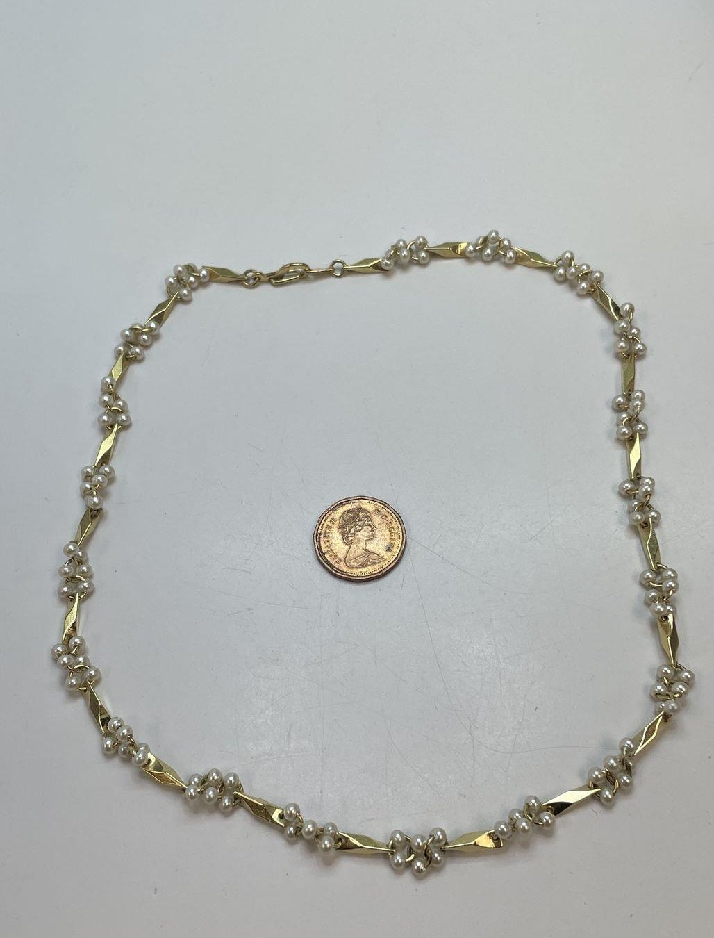Gold-tone faux pearl station necklace and matching bracelet set, view 3