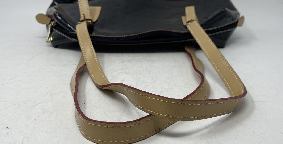 Black patent leather shoulder bag with beige leather trim and double rolled handles, view 4