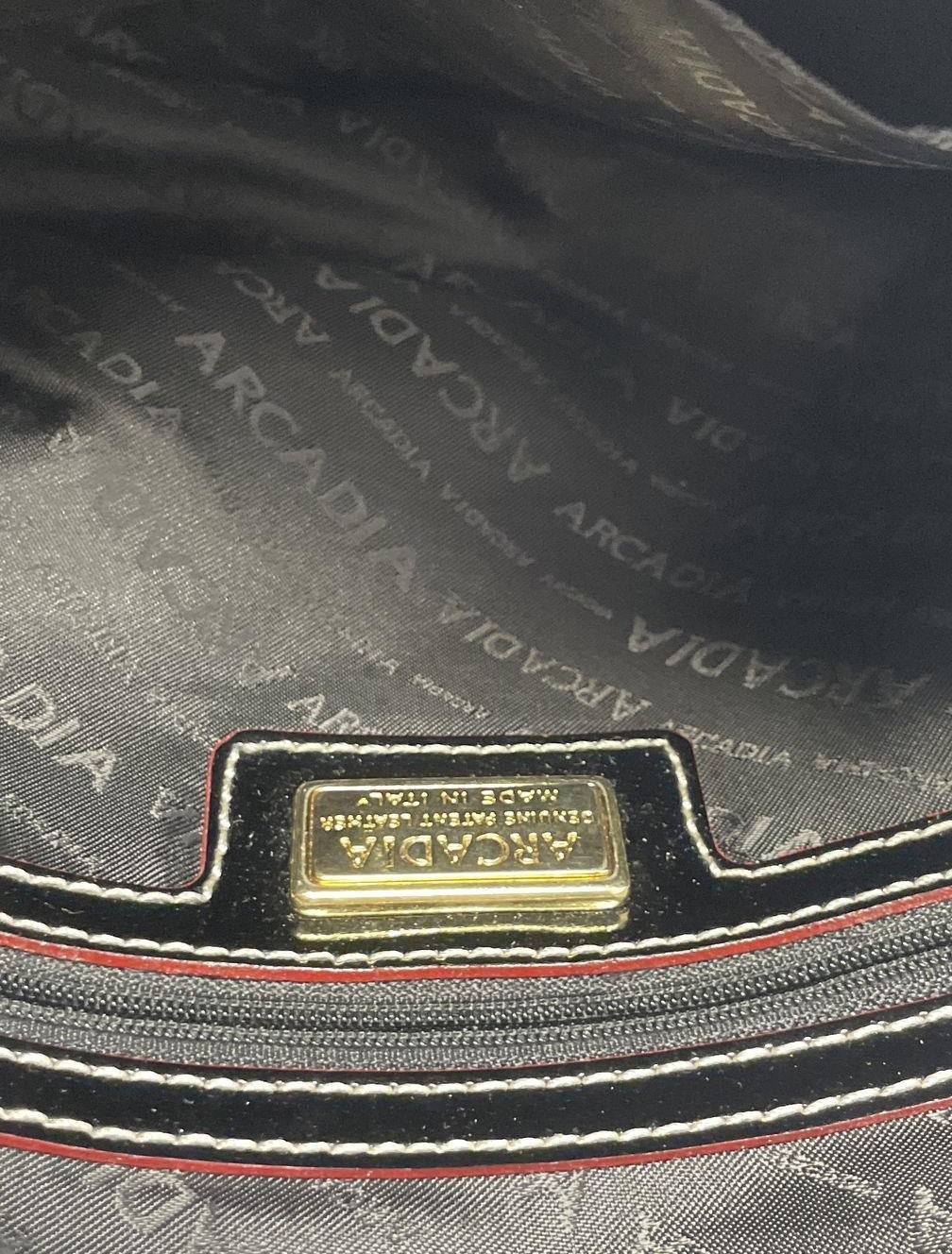 Black patent leather shoulder bag with beige leather trim and double rolled handles, view 5