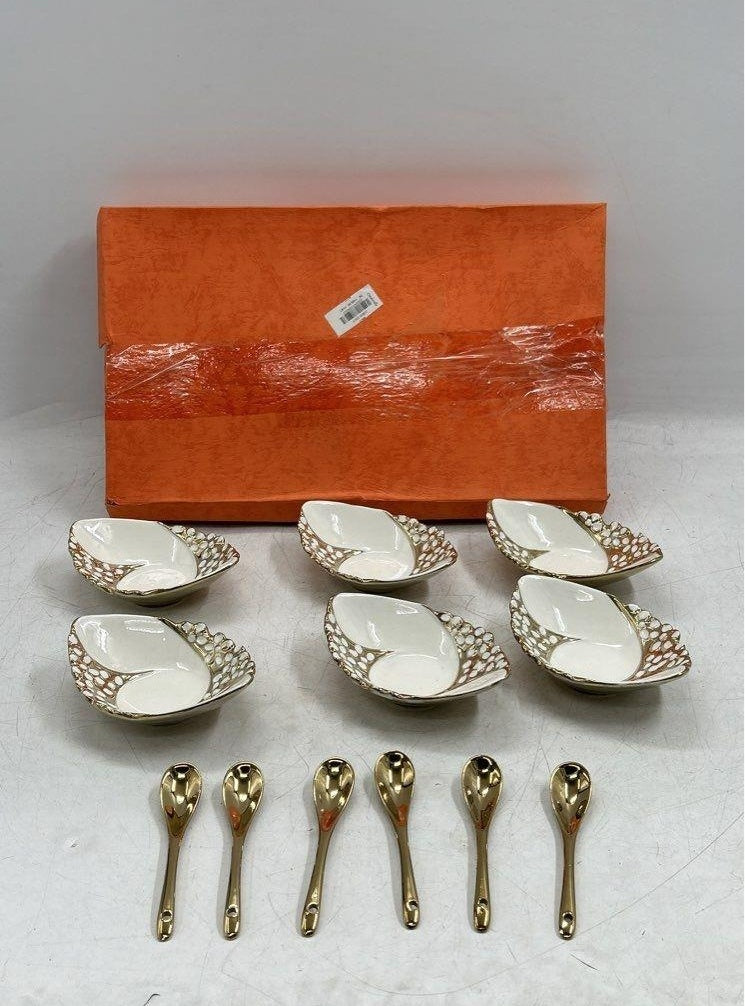 White shell-form dessert bowls with gold trim and gold-tone spoons in their box, view 2