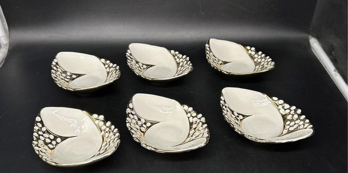White shell-form dessert bowls with gold trim and gold-tone spoons in their box, view 5