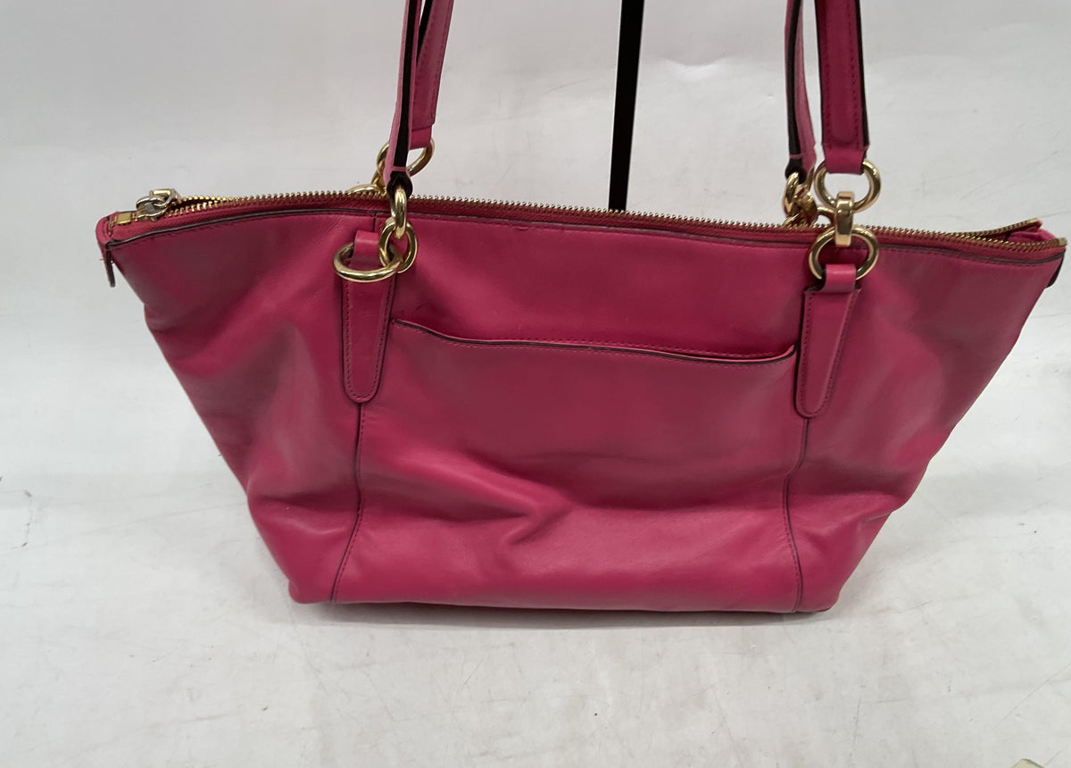 Coach fuchsia pink leather tote with gold-tone hardware and logo plaque, view 4