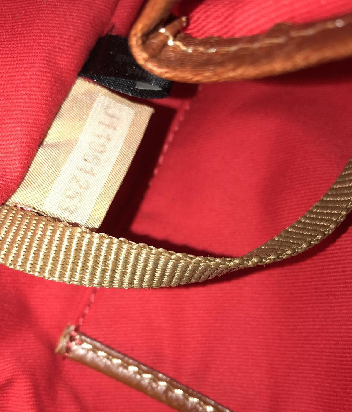 Dooney and Bourke navy blue suede shoulder purse with cognac brown leather trim and duck logo charm, view 9