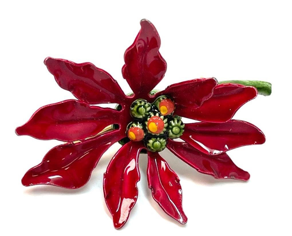 Gold-tone poinsettia brooch with red enamel petals and green enamel leaves, view 2