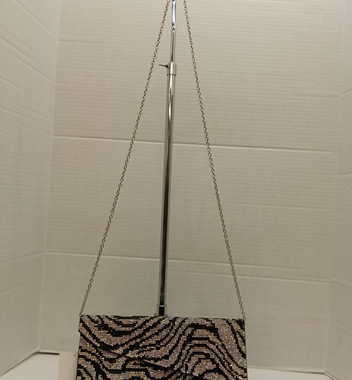 Black and silver zebra pattern rhinestone evening clutch with silver-tone chain strap, view 2