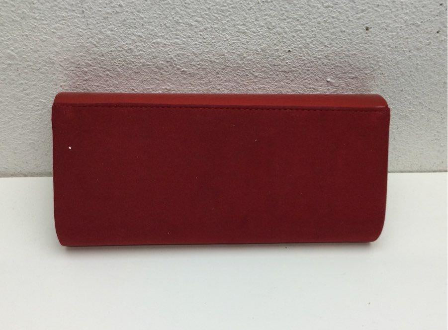 Red envelope clutch with flap front and long silver-tone chain shoulder strap, view 5